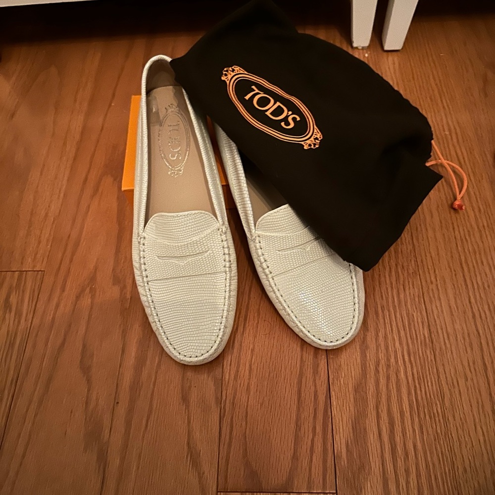 TOD’S white patterned leather loafers